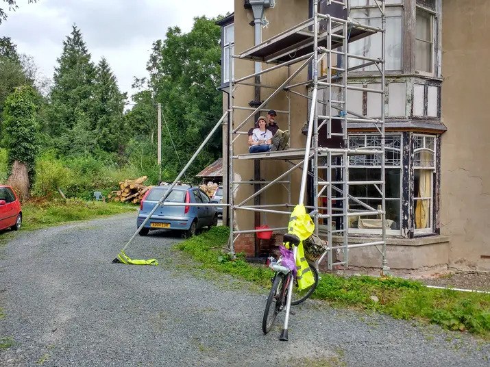Scaffolding and friendly faces